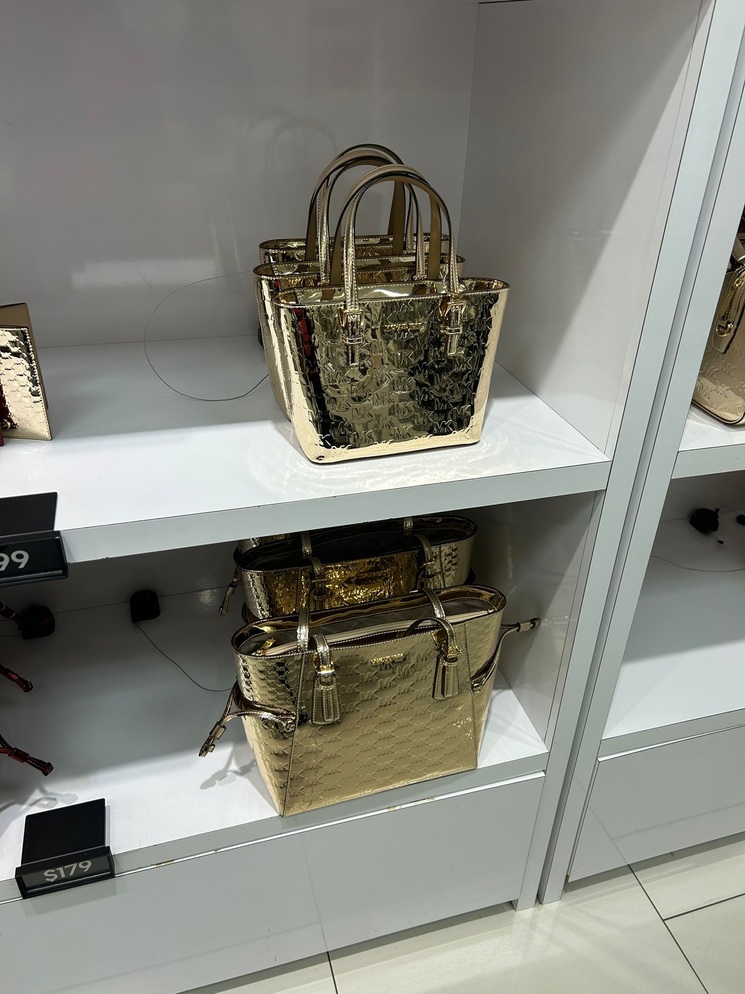 Women's Michael Kors Jet Set Extra-Small Metallic Logo Debossed Convertible Tote Bag PALE GOLD