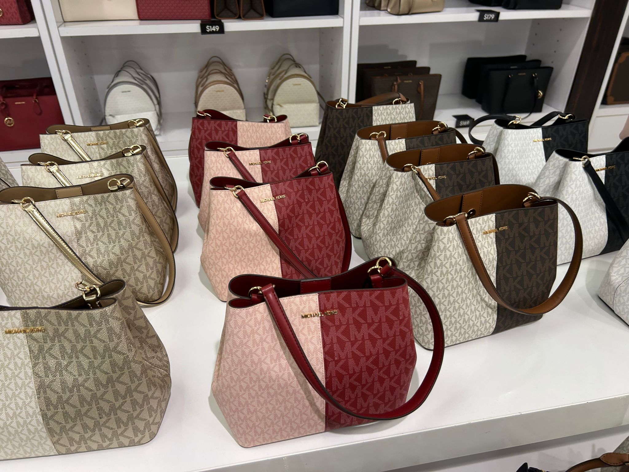 Michael Kors WOMENS' Pratt Medium Two-Tone Metallic Signature Logo Shoulder Bag CHERRY MULTI