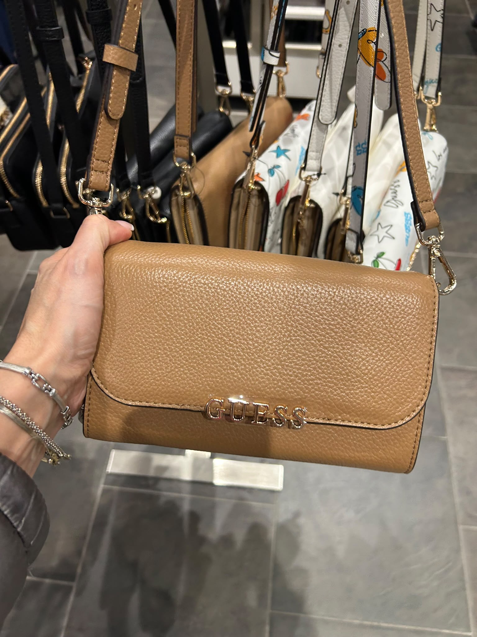 Guess Women's pebbled faux leather crossbody flap bag-Brown
