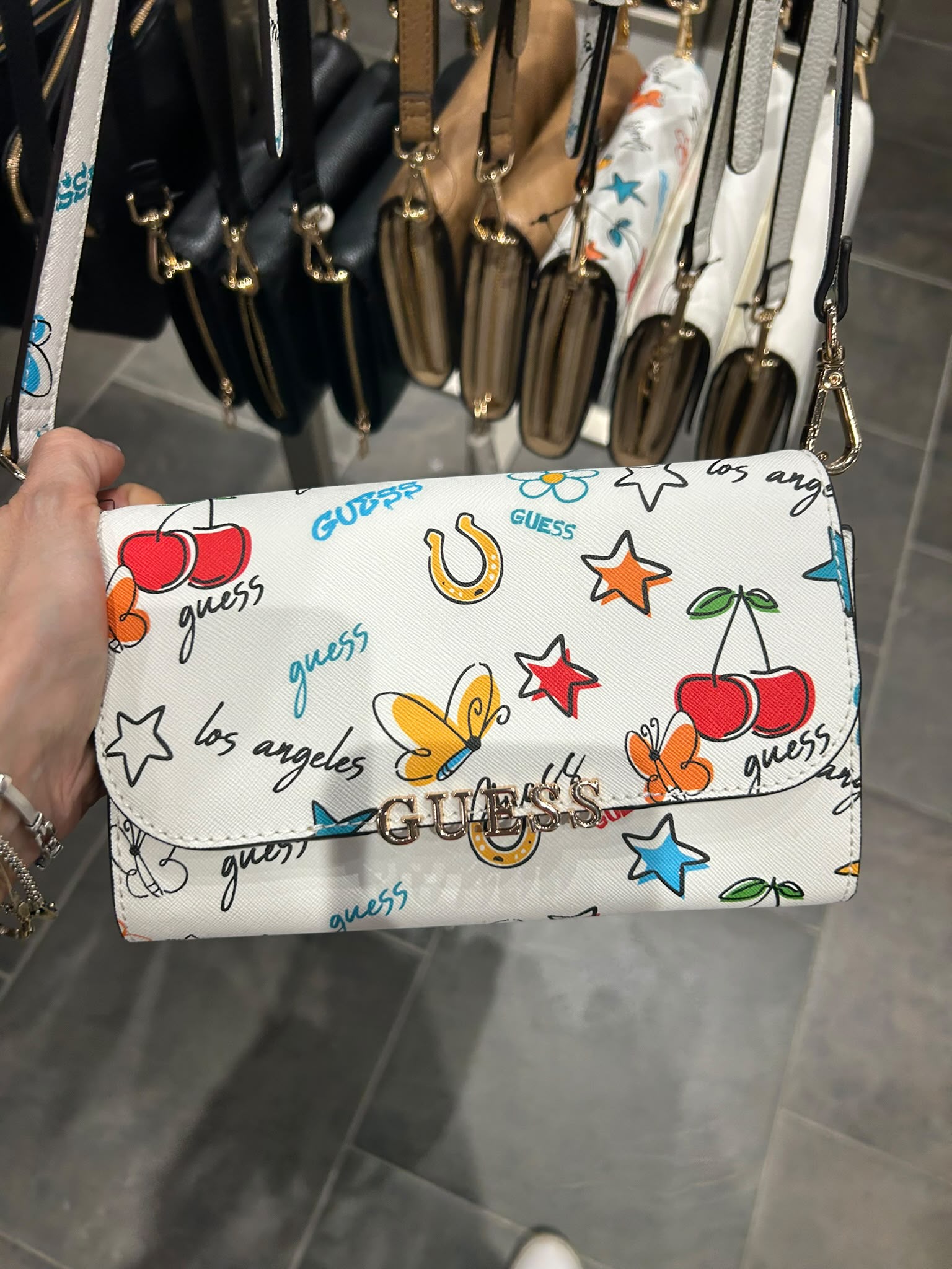 Guess Women's pebbled faux leather crossbody flap bag-colored graffiti print