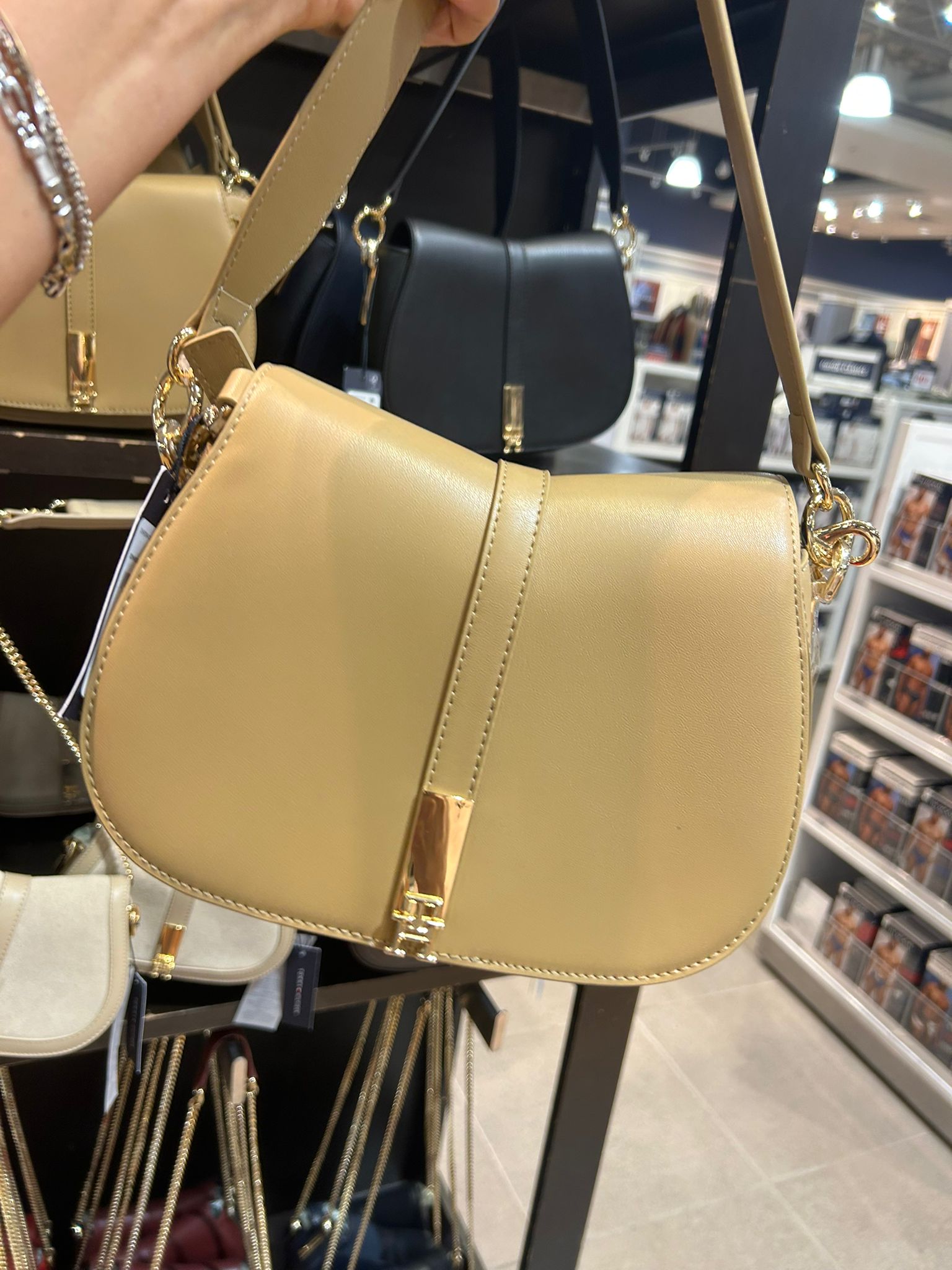 Womens' Tommy Hilfiger saddle bag, smooth texture