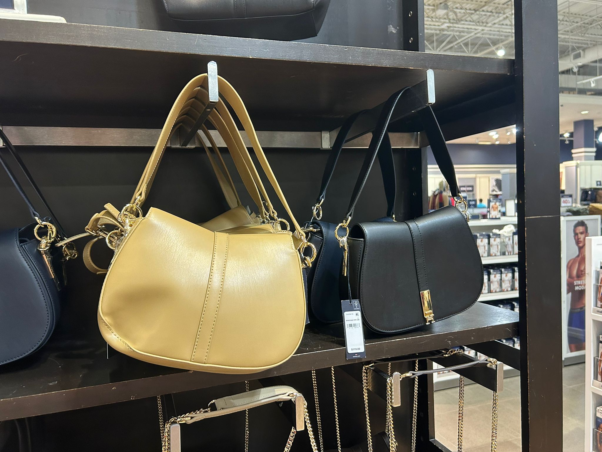 Womens' Tommy Hilfiger saddle bag, smooth texture