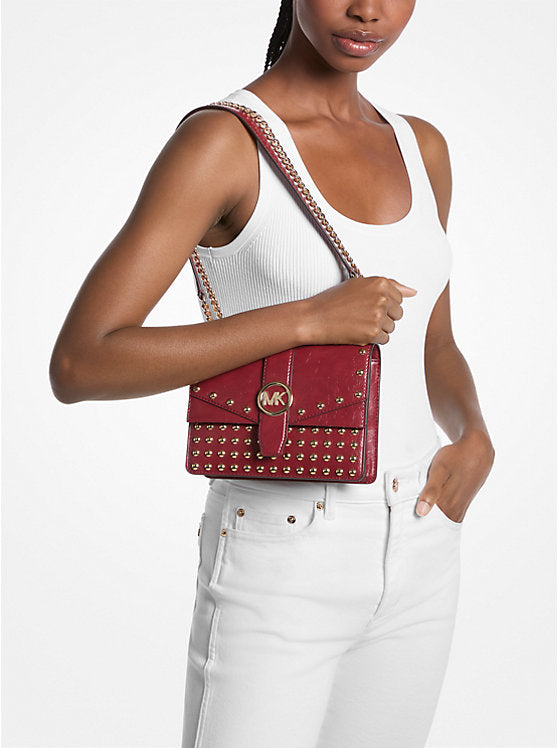Michael Kors WOMENS' Greenwich Small Studded Distressed Crossbody Bag CHERRY