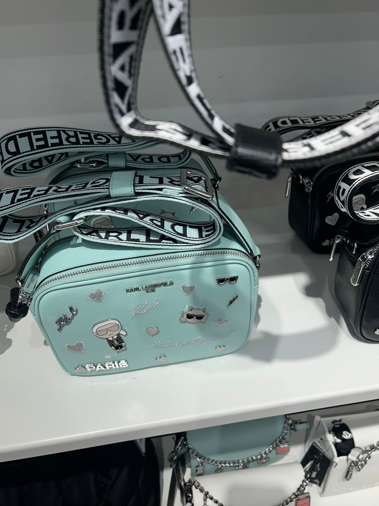 KARL LAGERFELD MAYBELLE CAMERA CROSSBODY WITH PINS-Baby Blue