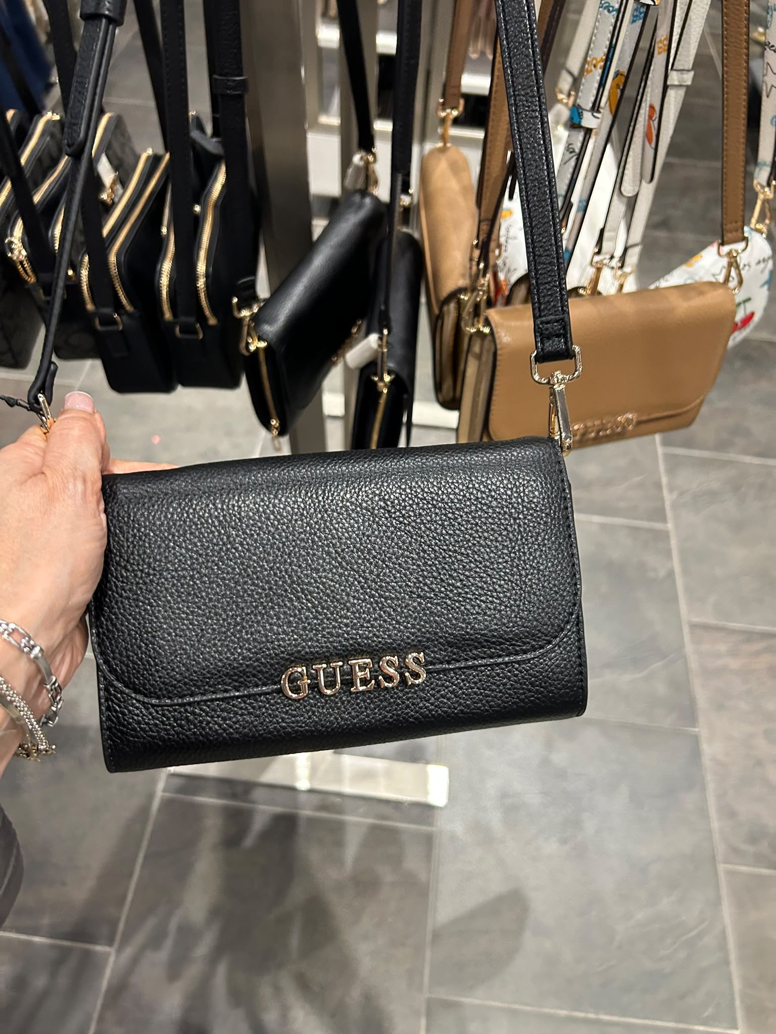 Guess Women's pebbled faux leather crossbody flap bag-Black