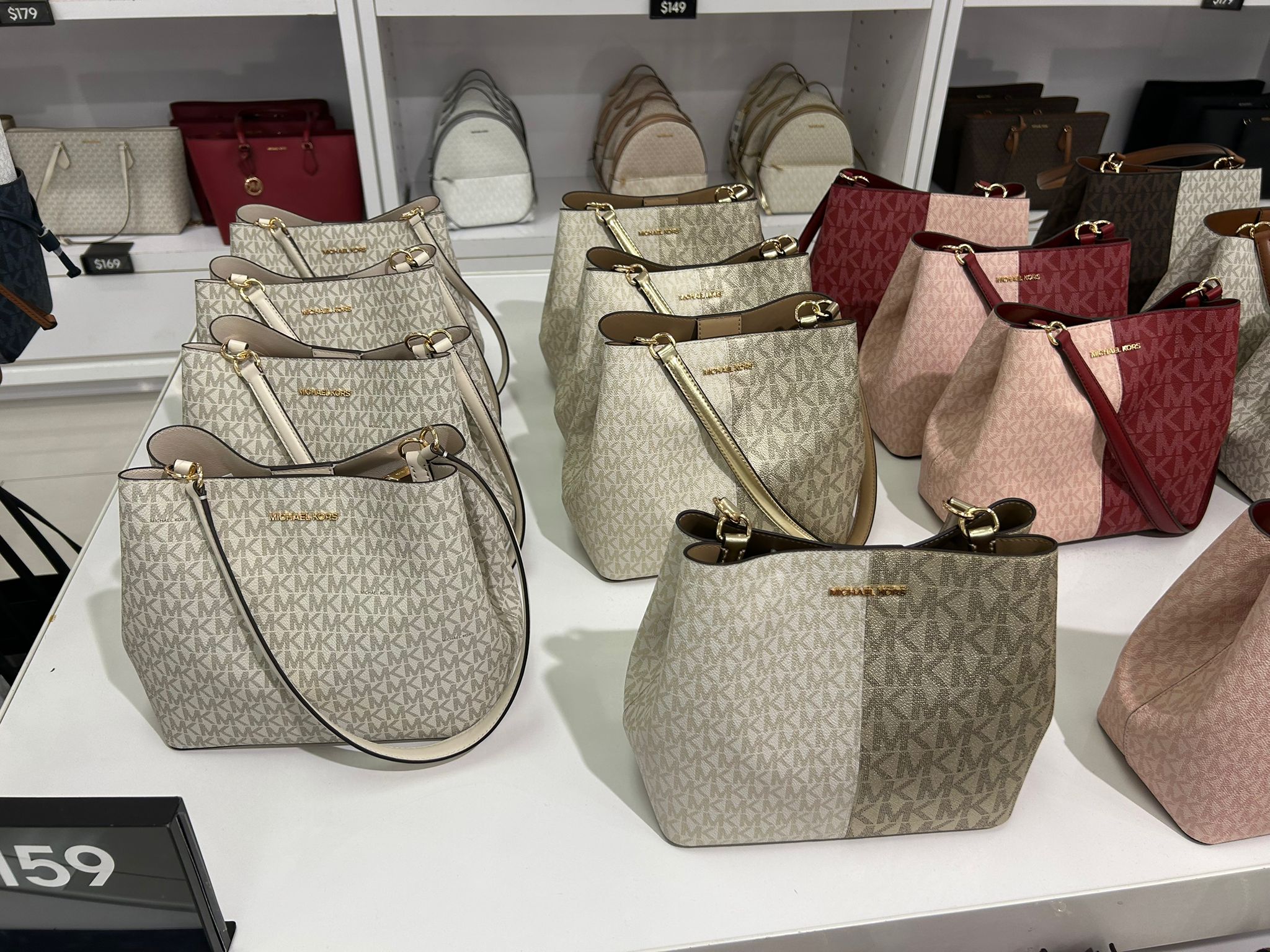 Michael Kors WOMENS' Pratt Medium Two-Tone Metallic Signature Logo Shoulder Bag