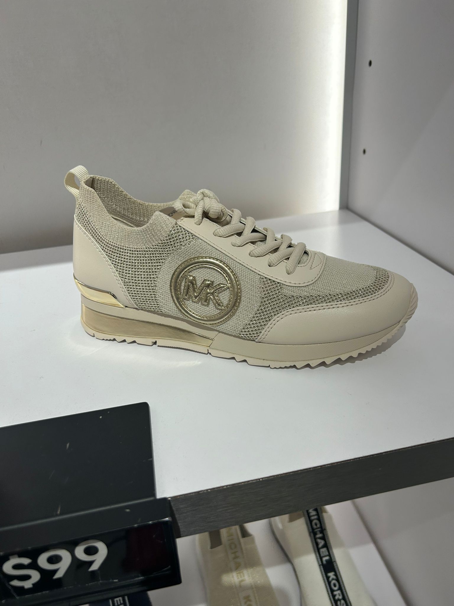 Michael Kors WOMENS' Jenkins Metallic Stretch Knit Trainer  PALE GOLD